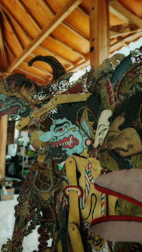 Detailed view of an intricately designed Wayang Kulit puppet from Jawa Barat, Indonesia.
