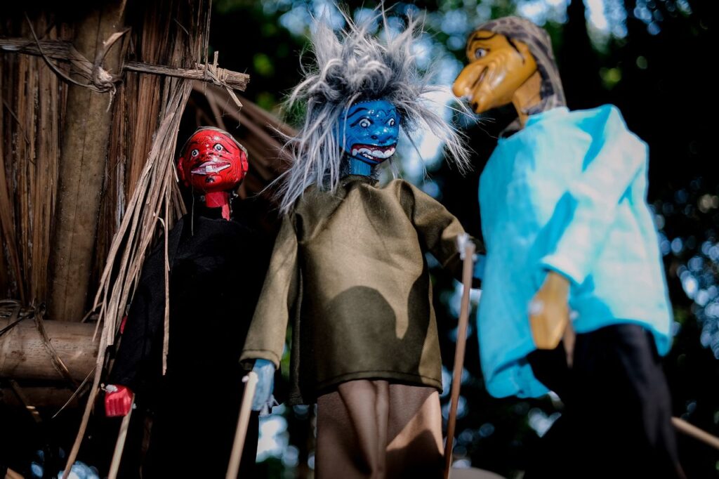 Colorful Wayang Golek puppets representing traditional Indonesian culture in West Java.